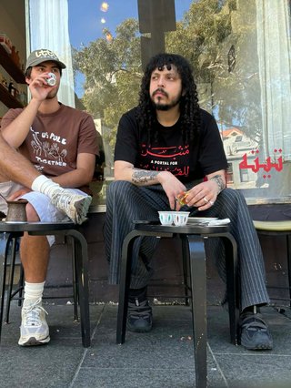 Tommy and Jono, drinking coffee at Tetas Deli