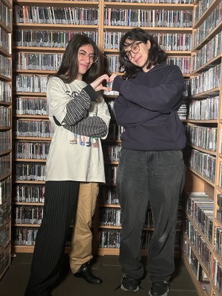 Sara and Dana, two Palestinian and Syrian baddies posing in the music library.