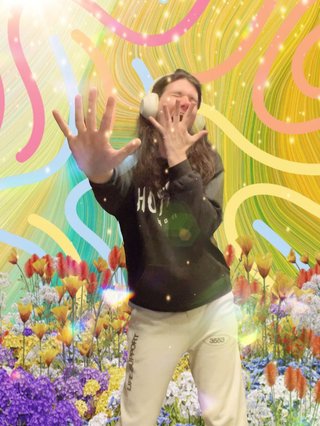 Jim edited into a very busy background made up of lines, sparkles, flowers and other accoutrements.