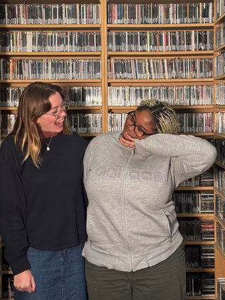 Ify and EBS posing in the music library