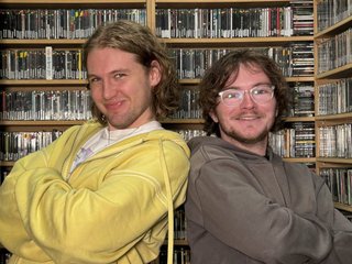 Gregor McMurray in the FBi Radio music room, posing back to back with 'Up for it' host Benny.