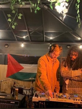 Jonathan and Tommy playing at a Fundraiser for Falasteen