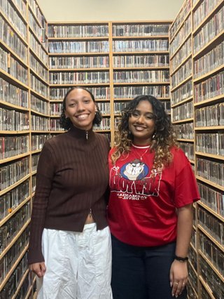 Briana in a brown jumper and anieszka in a red t-shirt smiling