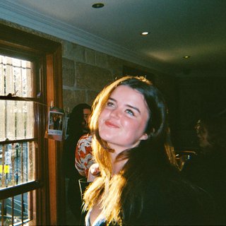 Freya smiles coyly as she poses for the image.