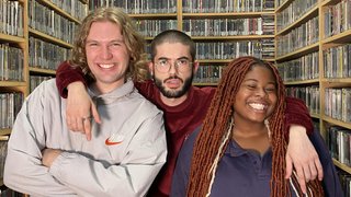 Benny, Guano C, and Ify stand in the fbi.radio music library. All three are looking at the camera, and Ify and Benny are smiling. Guano C looks fake confused. He stands in the middle with his arms over Ify and Benny's shoulders.