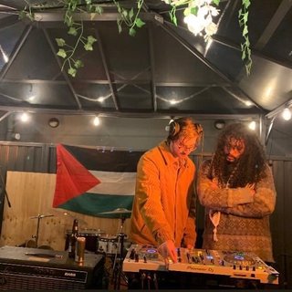 Tommy and Jono Playing at a fundraiser for Palestine