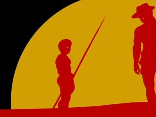 In the style of the Aboriginal flag, a yellow half circle sits against a black background. A slither of red ground sits on the bottom of the image. Two silhouetted figures stand against the yellow circle. The left figure holds a spear, the right figure is taller, wearing a brimmed hat and with a gun slung across their back.