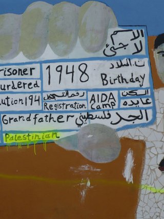 A painting of a man holding up an ID card with Arabic and english words.