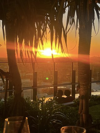 sunset view of a city from a rooftop