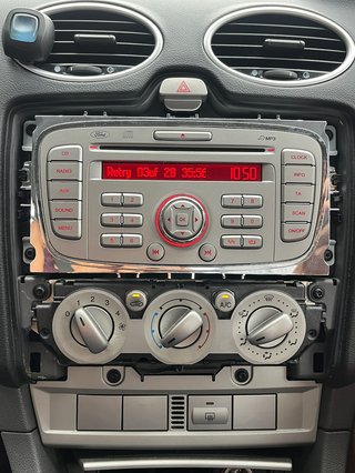 pictture of car stero requestinf keycode in red writing