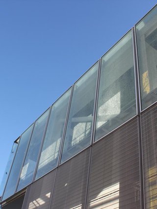 the facade of a caged building