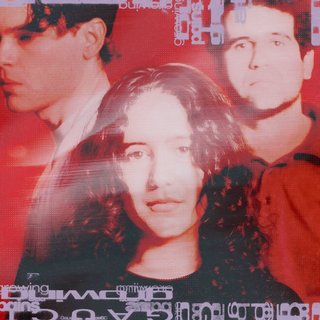 The three members of GAUCI , with Antonia GAUCI front and centre looking at the camera. A red filter covers them