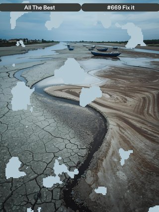 A dry curvy landscape with water at the top covered with some unique grey coloured blobs scattered around