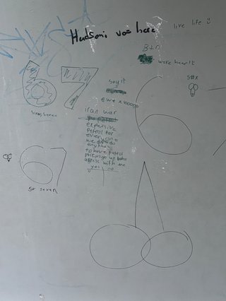 Scribbled graffiti on a white surface