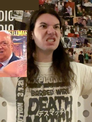 a very poor photoshop of Jim attempting to look menacing while Paul Heyman of WWE sneers over their shoulder